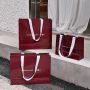 Custom angola red Paper shopping bags with white ribbon 