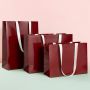 Custom High-end laser gradient paper bag thickened handbag packaging clothing store large gift shopping bag 